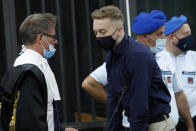 Finnegan Lee Elder, from California, talks with his lawyer Roberto Capra after a break in his trial where he and his friend Gabriel Natale-Hjorth are accused of slaying a plainclothes Carabinieri officer while on vacation in Italy last summer, in Rome, Wednesday, Sept. 16, 2020. (Remo Casilli/Pool Photo via AP)