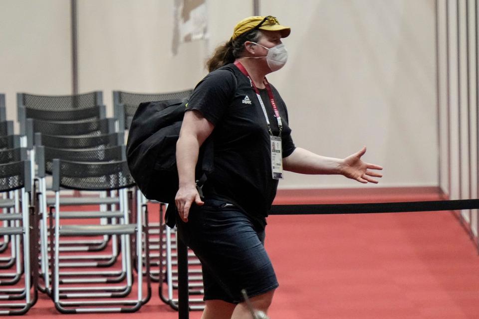 Laurel Hubbard arrives for practice on Saturday in Tokyo (AP)