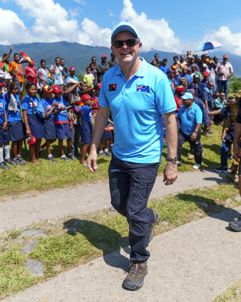 In this image supplied by the Australian Prime Ministers office, Australian Prime Minister Anthony Albanese starts his walk along the Kokoda Track at Kokoda Village, Papua New Guinea, Tuesday, April 23, 2024. Albanese and Papua New Guinea’s Prime Minister James Marape on Tuesday began trekking into the South Pacific island nation’s mountainous interior to commemorate a pivotal World War II campaign and to underscore their security alliance that is challenged by China's growing regional influence. (Prime Ministers office via AP)