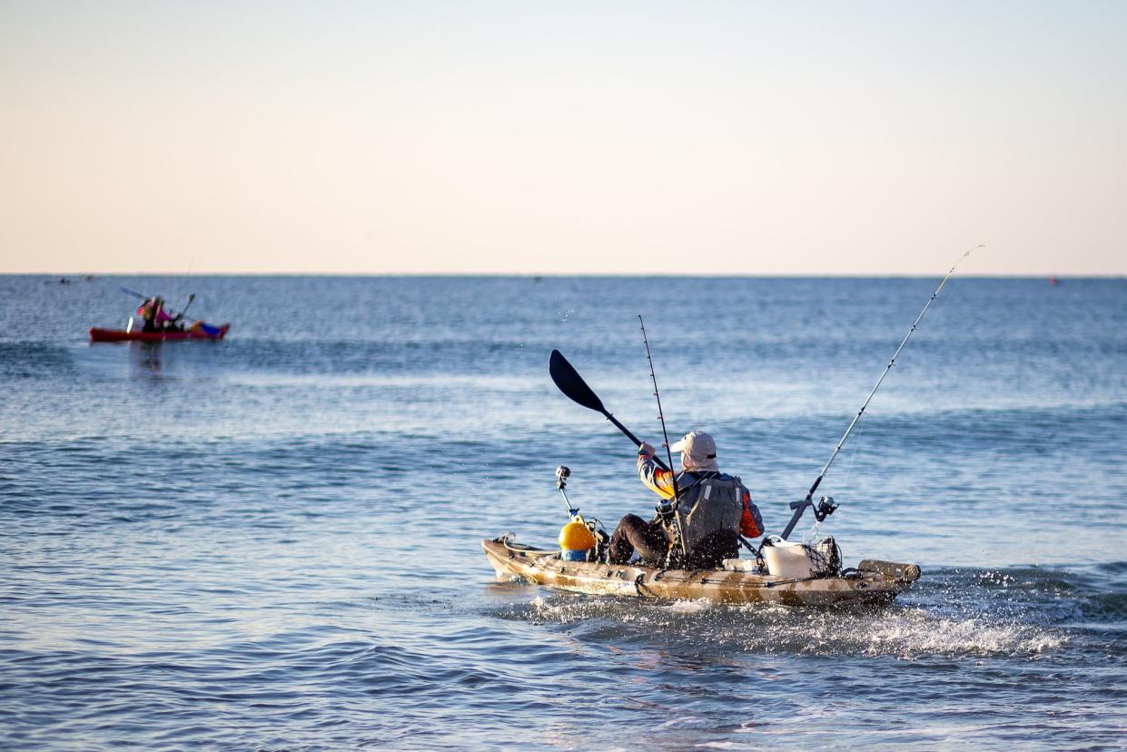 what to wear when kayaking paddler on the ocean