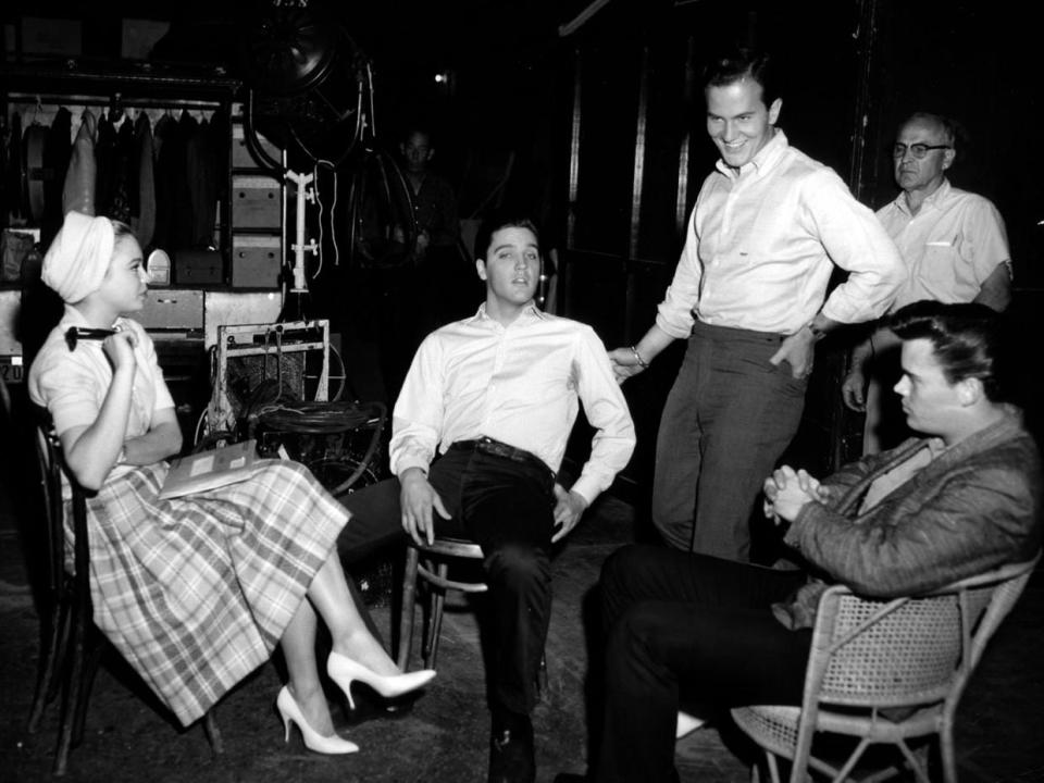 Pat Boone (standing by Elvis) visit Elvis and actress Juliet Prowse on the set of "G.I. Blues."