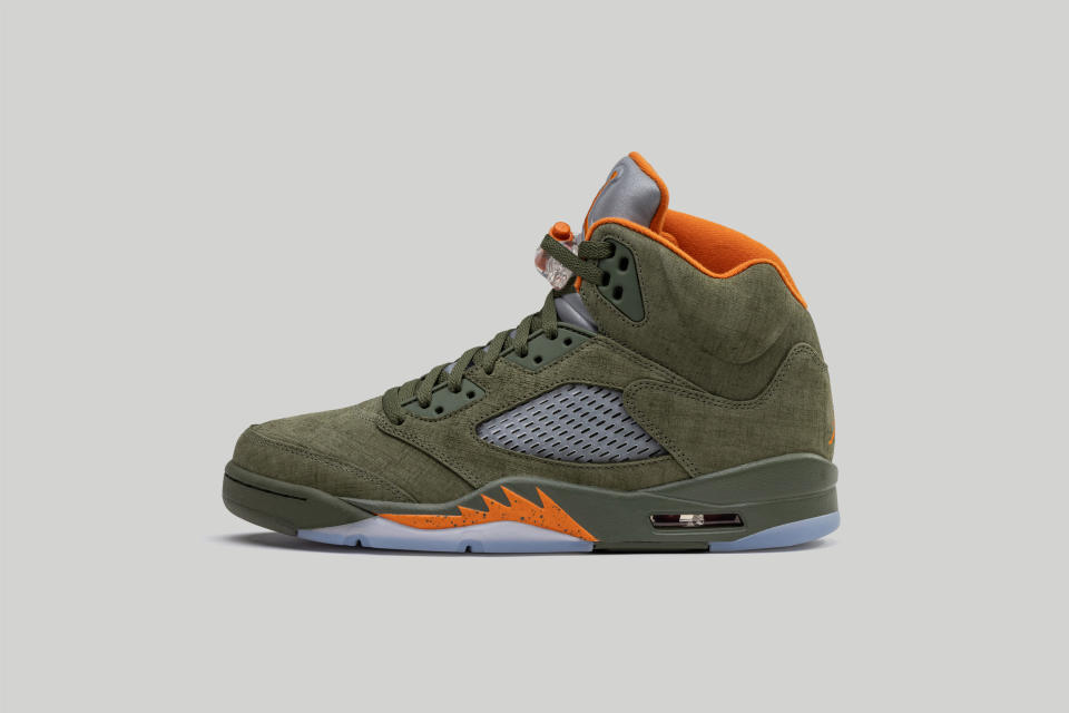 A real pair of Air Jordan 5 sneakers in olive.