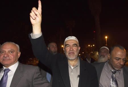 Sheikh Raed Salah (C), head of the Islamic Movement in northern Israel, gestures after arriving in Israel, outside Ben Gurion International Airport near Tel Aviv April 16, 2012. REUTERS/Ammar Awad