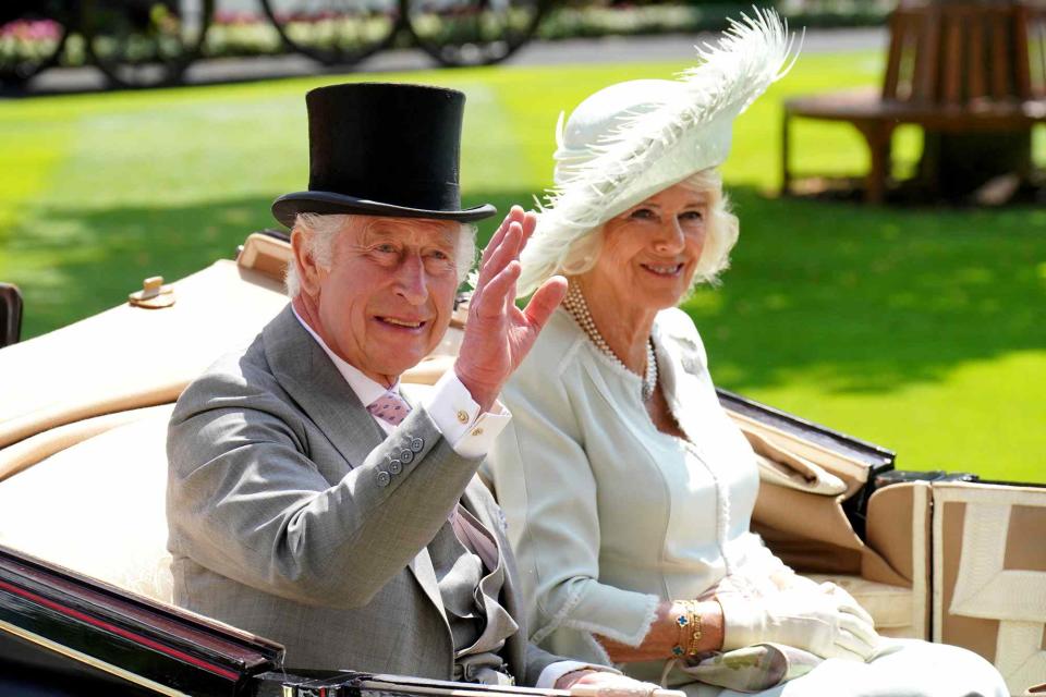 <p>Jonathan Brady/PA Images via Getty </p> King Charles III and Queen Camilla arrive by carriage during day three of Royal Ascot