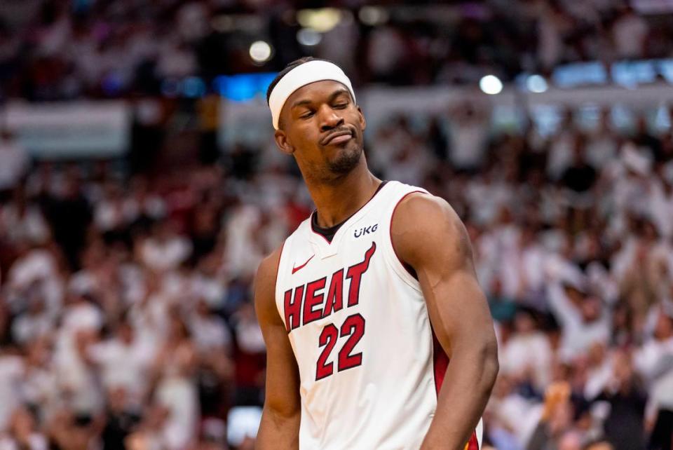 Miami Heat forward Jimmy Butler (22) reacts after scoring against the Milwaukee Bucks during the fourth quarter of Game 4 in the first-round NBA basketball playoff series at the Kaseya Center on Monday, April 24, 2023, in downtown Miami, Fla. MATIAS J. OCNER/mocner@miamiherald.com