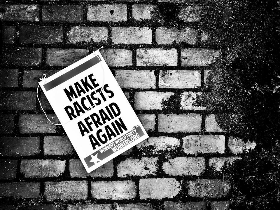 <p>A “Make Racists Afraid Again” sign on the ground near the site of a counterprotest against a “free speech” rally staged by conservative activists Aug. 19 in Boston. (Photo: Holly Bailey/Yahoo News) </p>