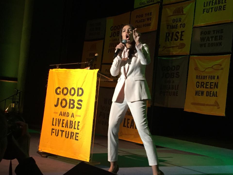 Rep. Alexandria Ocasio-Cortez, D-N.Y., responds to a crowd at Howard University Monday who gathered to cheer her Green New Deal.