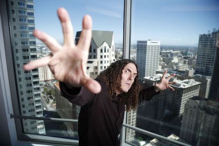 Musician "Weird Al" Yankovic poses for a portrait in the Reuters bureau in Los Angeles, California July 24, 2014. REUTERS/Lucy Nicholson