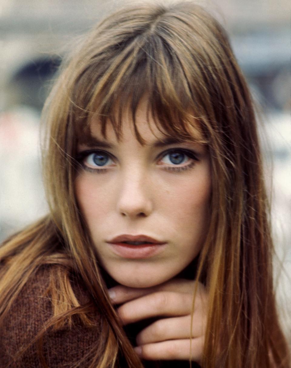 Jane Birkin, seen here in 1960, made bangs the epitome of French-girl cool. (Photo: REPORTERS ASSOCIES via Getty Images)