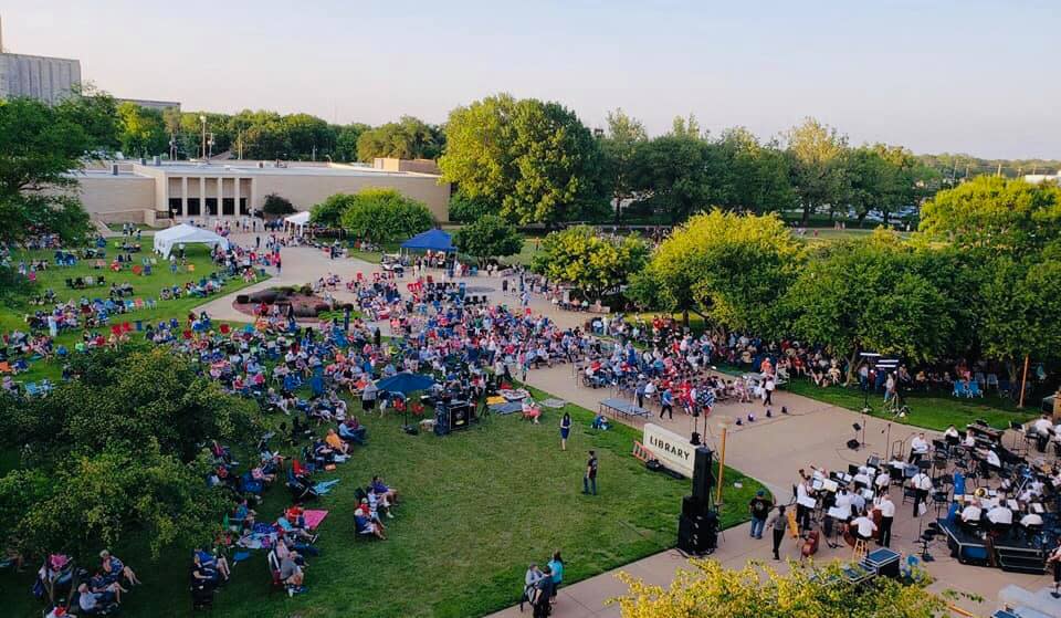 Crowds gather before the Salina Symphony performs at the Eisenhower Presidential Library for a previous edition of "Symphony at Sunset," commemorating the anniversary of D-Day. The concert this year will take place on June 1.