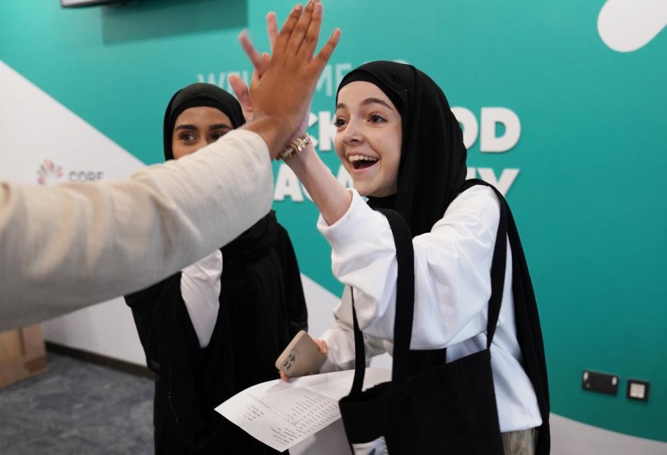 Shannon Rostam (right) receiving her GCSE results at Rockwood Academy secondary school in Alum Rock, Birmingham (Jacob King/PA) (PA Wire)