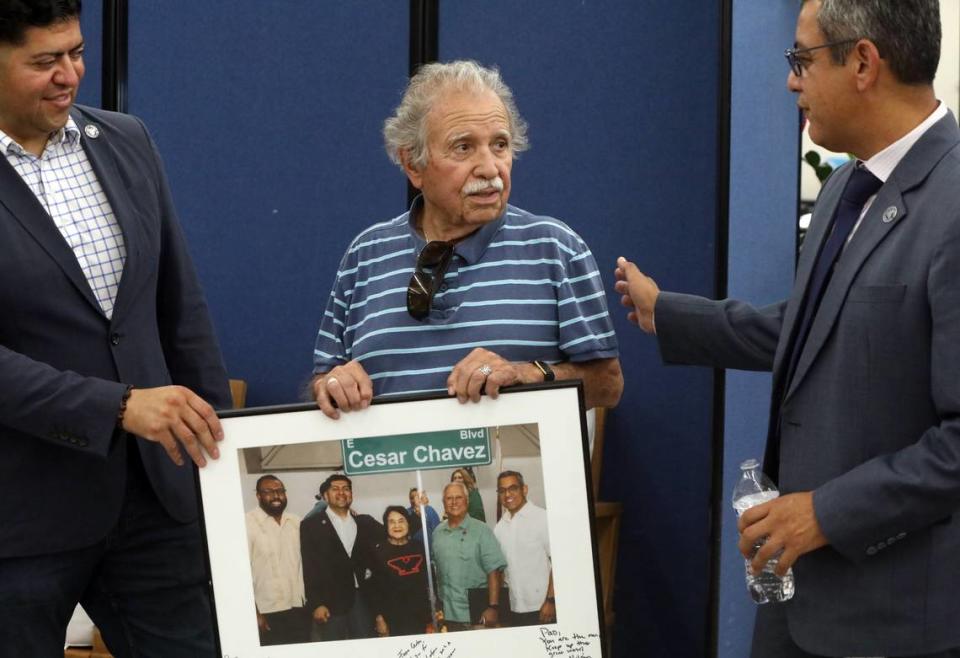 Fresno City Councilmembers Luis Chávez and Miguel Arias presented Venancio Gaona with a portrait during the July 26, 2024 celebration in southeast Fresno.