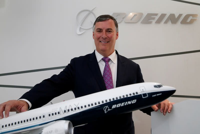 Boeing Commercial Airplanes President, Kevin McAllister poses with a model of 737 MAX 10, during the 52nd Paris Air Show at Le Bourget Airport near Paris