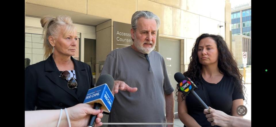 Pratt's stepmother Carrie Doyle, left, father Tracy Pratt and sister Quiann Bulmer speak to reporters outside Hamilton's courthouse on Friday, May 24. 