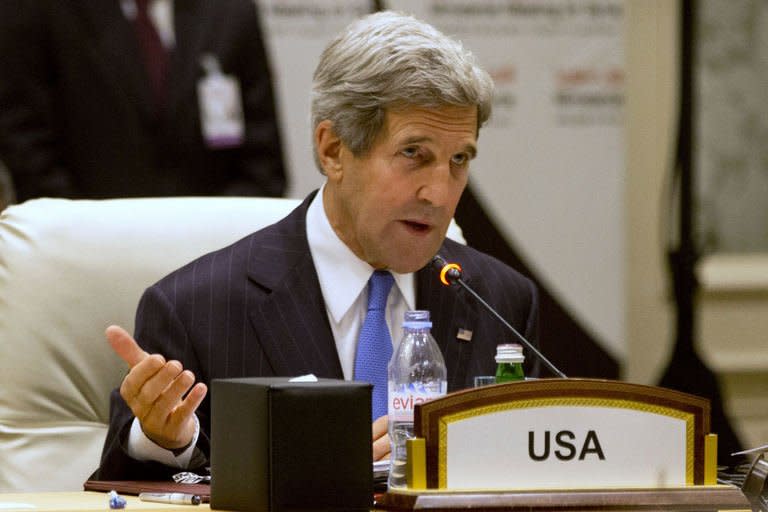 US Secretary of State John Kerry addresses the "Friends of Syria" meeting in the Qatari capital Doha on June 22, 2013