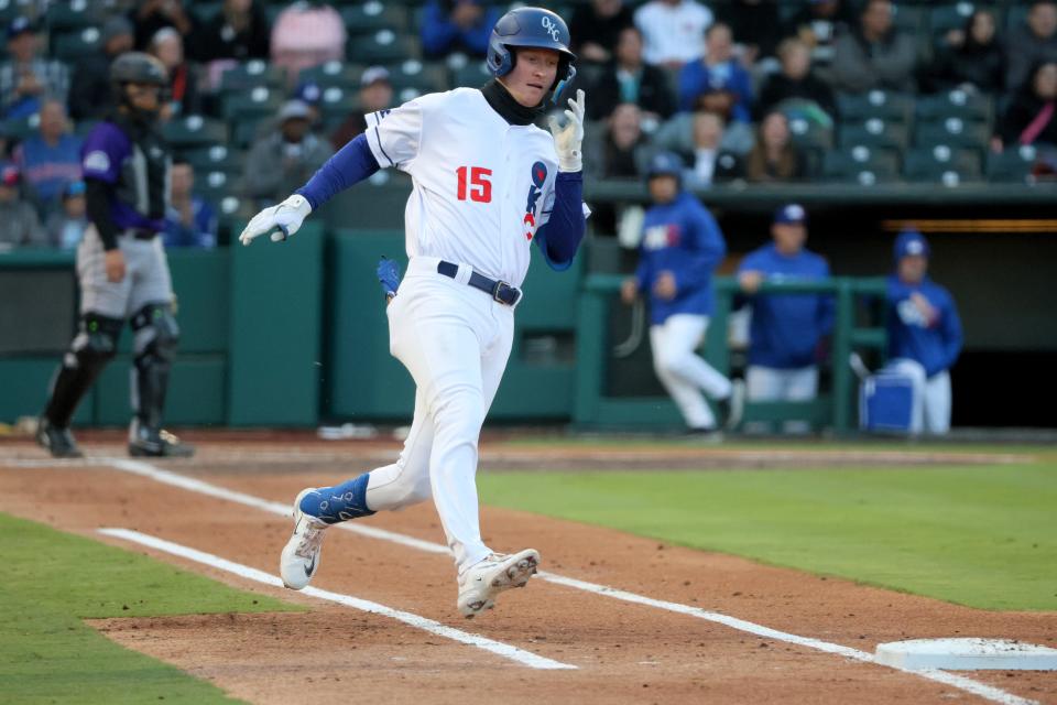 Oklahoma City's Kody Hoese runs to first as he drives in a run during the home opener for the Oklahoma City Baseball Club against the Albuquerque Isotopes at Chickasaw Bricktown Ballpark in Oklahoma City, Tuesday, April 2, 2024.