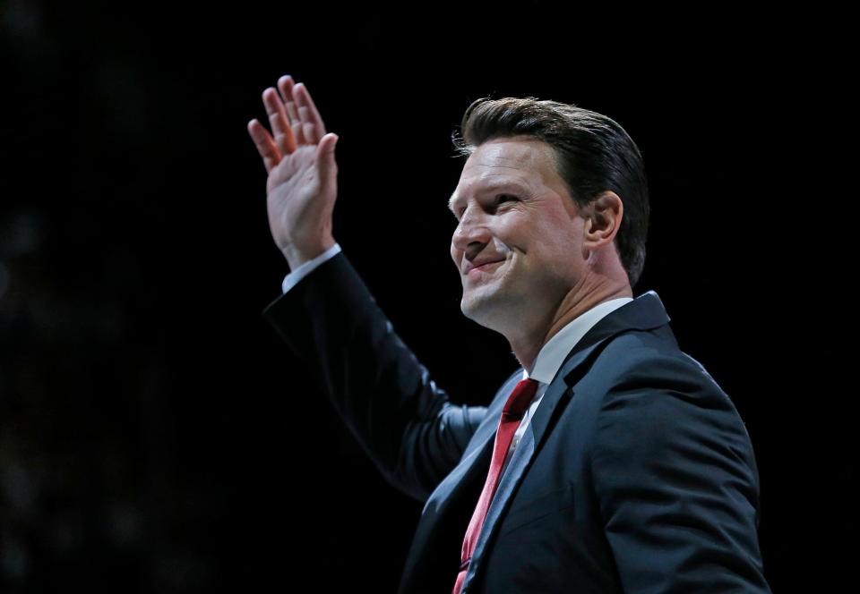 Shane Doan waves to fans as they clap after his jersey was raised during the jersey retirement ceremony at Gila River Arena in Glendale, Ariz. on Feb. 24, 2019. The franchise is under fire for the reported way it treated him when he exited working for the team.
