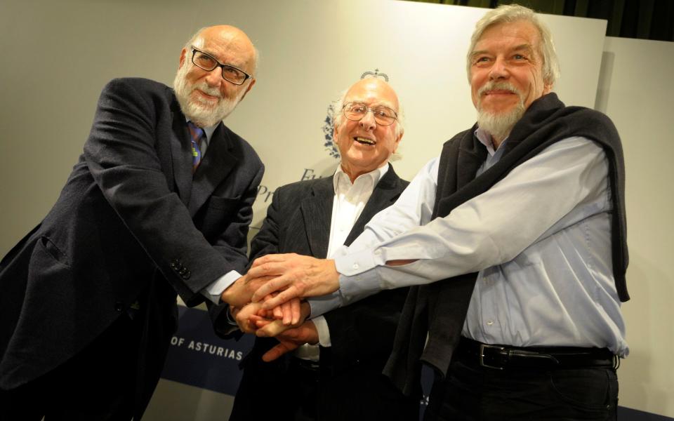 HIggs with François Englert, left, and Rolf Heuer before the presentation of their Prince of Asturias Award for Technical and Scientific Research; Higgs and Englert shared the Nobel Prize that year