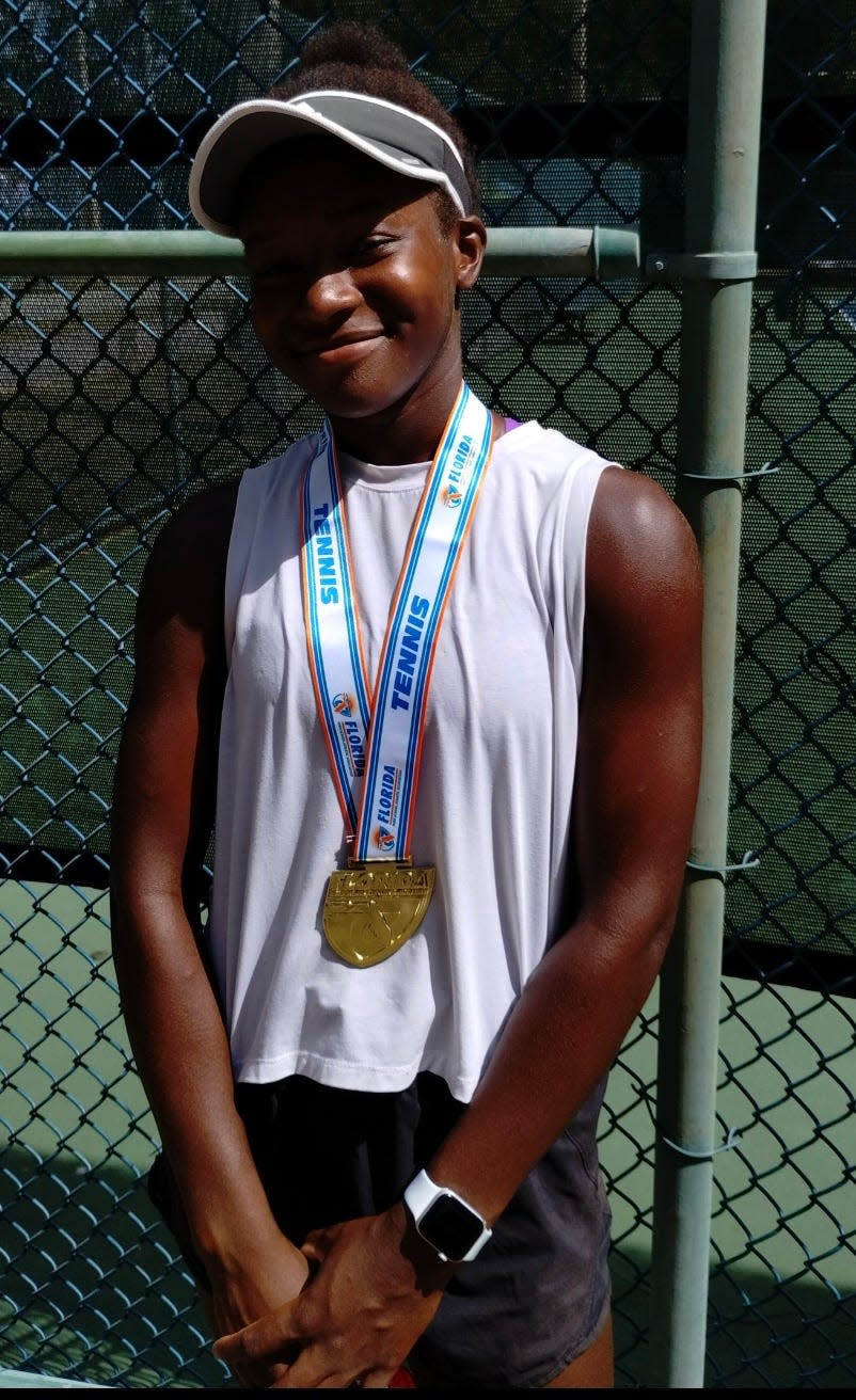 Braden River tennis player Smarty Chukwunoneeru after winning the Class 3A individual state title in Altamonte Springs.