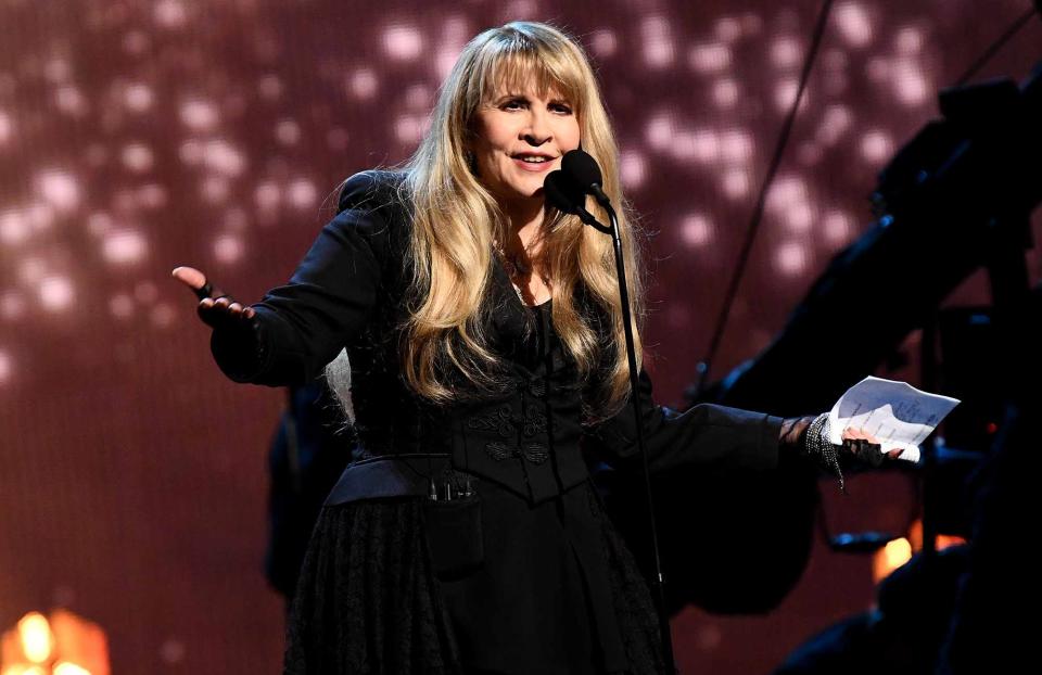 <p>Dimitrios Kambouris/Getty Images</p> Rock & Roll Hall of Fame inductee Stevie Nicks speaks onstage at the induction ceremony at Barclays Center on March 29, 2019, in New York City