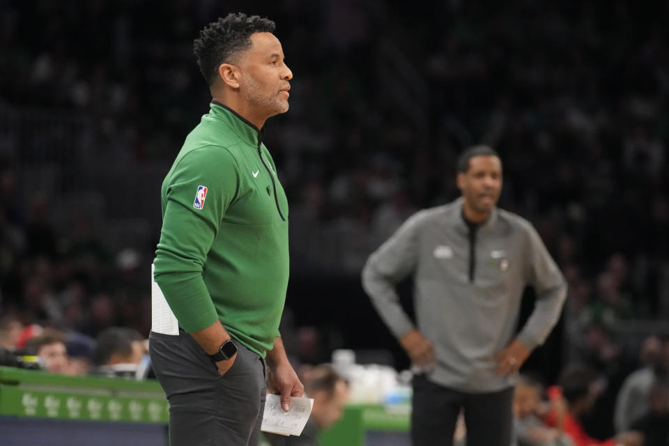 FILE - Boston Celtics assistant coach Damon Stoudamire, filling in for interim head coach Joe Mazzulla, draws up a play during a time out in the first half of an NBA basketball game against the Houston Rockets on Dec. 27, 2022, in Boston. Stoudamire was hired Monday, March 13, 2023, as Georgia Tech's men's basketball coach. (AP Photo/Charles Krupa, File)