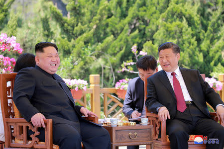 North Korean leader Kim Jong Un meets with China's President Xi Jinping, in Dalian, China in this undated photo released on May 9, 2018 by North Korea's Korean Central News Agency (KCNA). KCNA/via REUTERS/Files