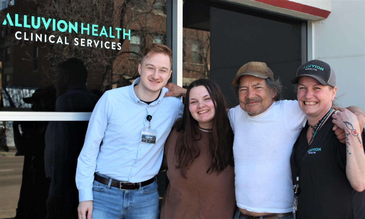 PATH Program Manager Kevin Purinton, Housing Navigator Ericka Mickelson, PATH client William 'Chico' Henderson and PATH Specialist Laura Allen share a moment before the Alluvion Clinic office at 510 1st Ave. N. in Great Falls.