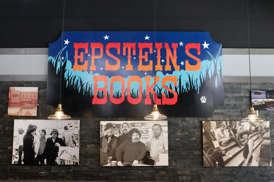 The recreation of the old Epstein's Books sign, with accompanying photos featuring the restaurant's namesake, Harry Epstein, is pictured at Harry's Bar & Grill on Monday, Aug. 21, 2023. The restaurant pays homage to the downtown bookstore owned by Hart Epstein's father and his uncle Glen.