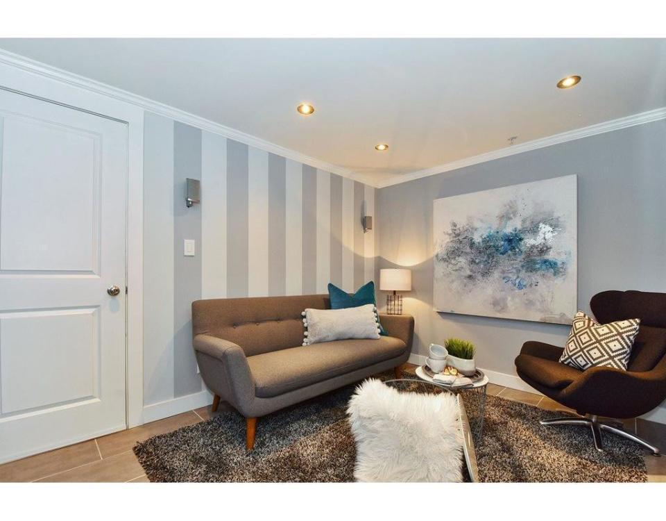 <p><span>1378 East 27th Ave., Vancouver, B.C.</span><br> The media room has soundproof walls, remote-operated lighting and built-in AV wiring.<br> (Photo: Zoocasa) </p>