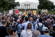 Michael Avenatti, attorney for porn actress Stormy Daniels, speaks at a protest outside the White House, Tuesday, July 17, 2018, in Washington. This is the second day in a row the group has held a protest following President Donald Trump's meetings with Russian President Vladimir Putin. (AP Photo/Andrew Harnik)