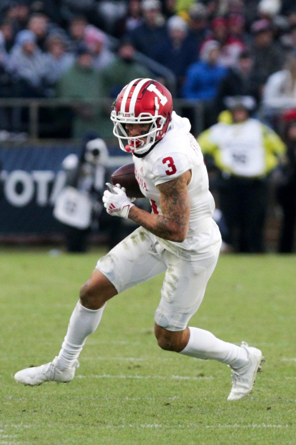 Indiana wide receiver Ty Fryfogle (3) runs the ball during the second quarter of an NCAA college football game, Saturday, Nov. 27, 2021 at Ross-Ade Stadium in West Lafayette.