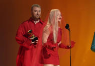 Kim Petras, right, and Sam Smith accept the award for best pop duo/group performance for "Unholy" at the 65th annual Grammy Awards on Sunday, Feb. 5, 2023, in Los Angeles. (AP Photo/Chris Pizzello)