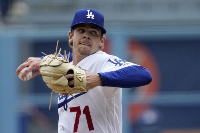 Los Angeles Dodgers starting pitcher Gavin Stone throws to the plate during the first inning.