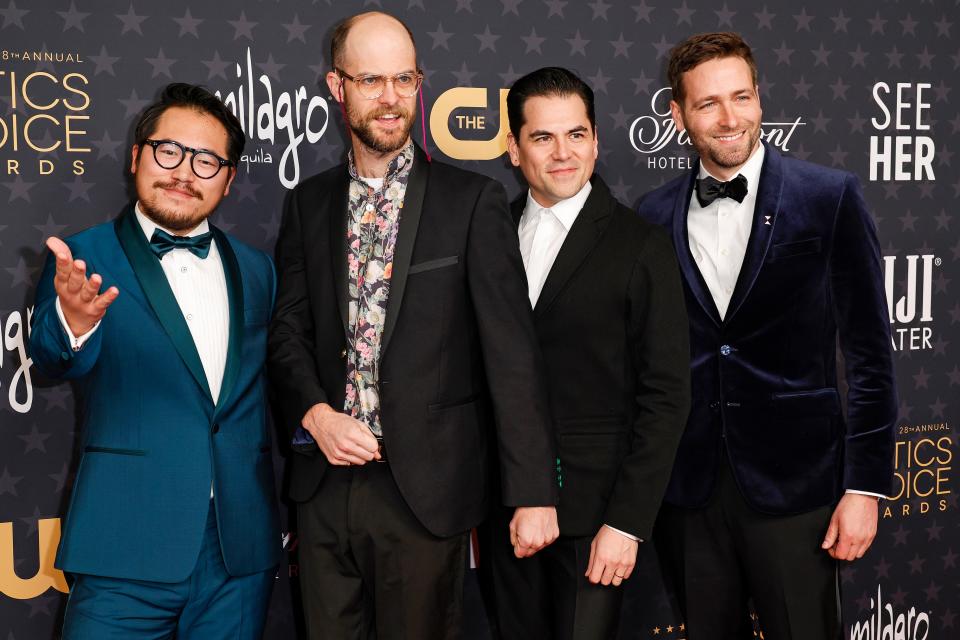 Daniel Kwan, Daniel Scheinert, Jonathan Wang, and Paul Rogers attend the 28th Critics Choice Awards on January 15, 2023, in Los Angeles, California.