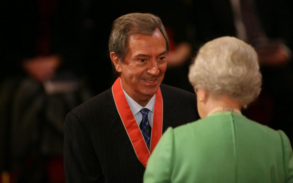 Des O'Connor receiving a CBE for services to entertainment and broadcasting from the Queen in 2008 - PA