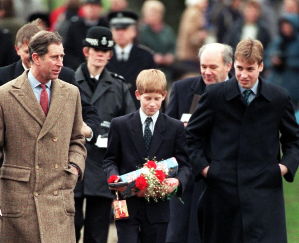 William and Harry pictured with their father leaving church after the Christmas Day service (John Stillwell/PA) (PA Archive)