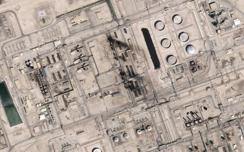 This satellite overview handout image obtained September 16, 2019 courtesy of Planet Labs Inc. shows damage to oil infrastructure from weekend drone attacks at Abqaig 