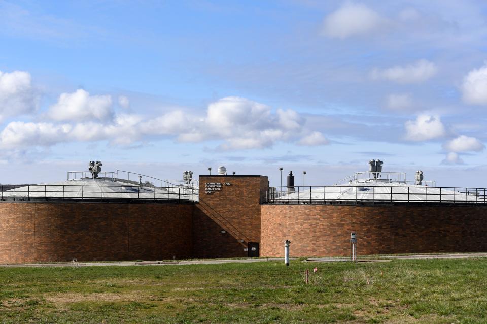 Digestion tanks where microbes consume the solids separated from wastewater stand at the Sioux Falls Water Reclamation Plant on Tuesday, May 3, 2022.