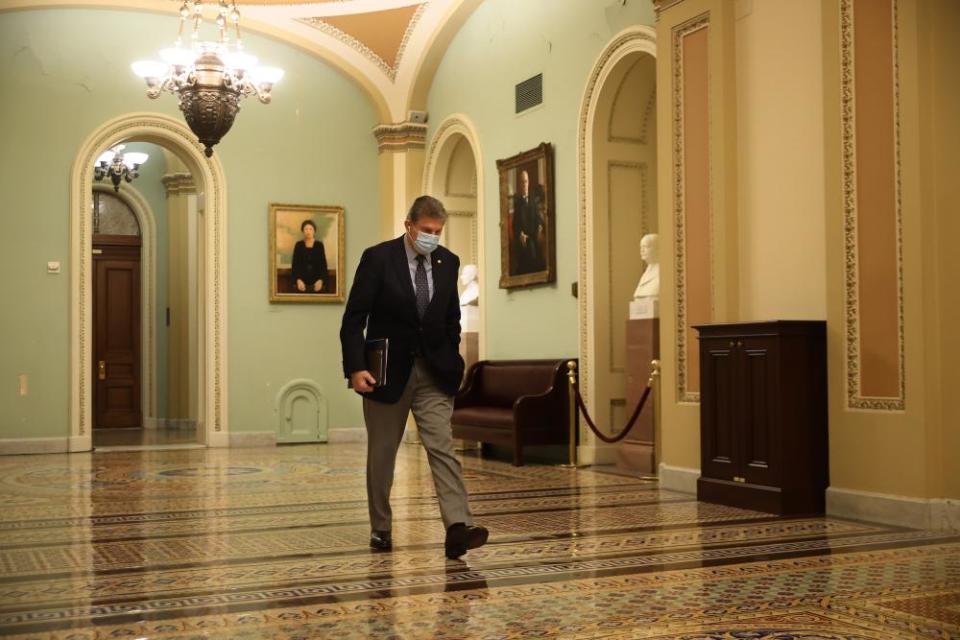Joe Manchin leaves the Senate chamber last month.