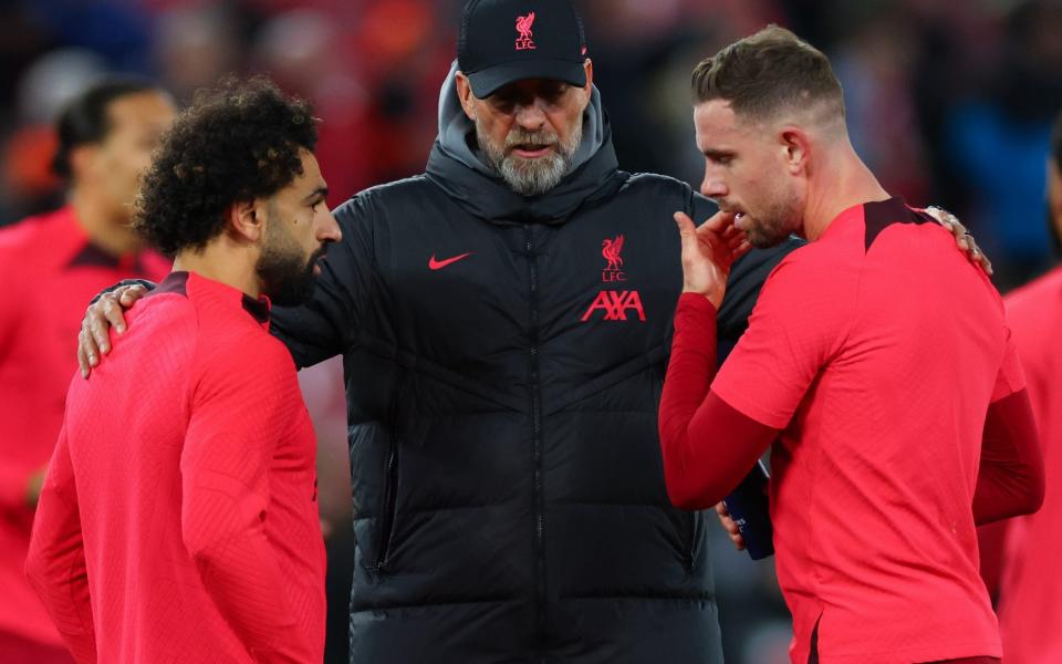 Mohamed Salah (left to right), Jürgen Klopp and Jordan Henderson - Jurgen Klopp’s quandary at Liverpool: Bad luck, injury woes or recruitment issues? - Getty Images/Marc Atkins