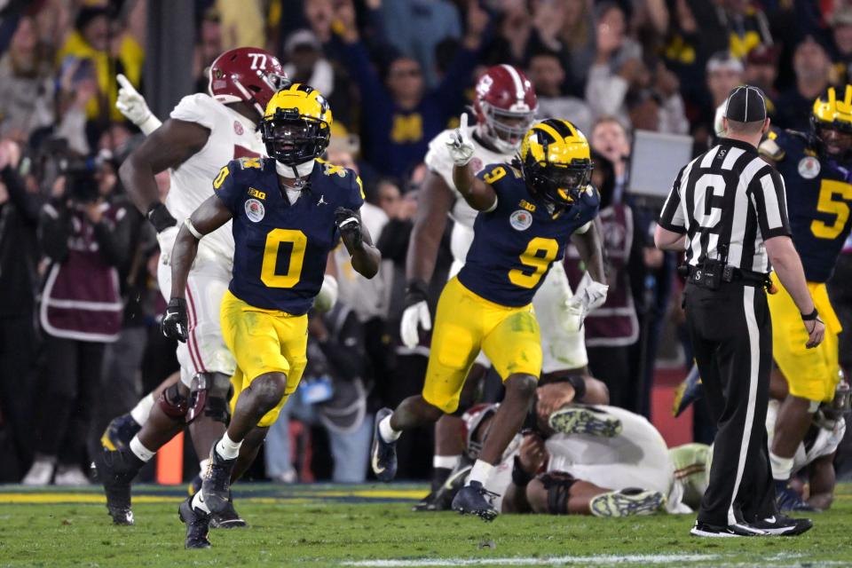 Michigan defensive back Mike Sainristil (0) celebrates after defeating Alabama in their College Football Playoff semifinal at the 2024 Rose Bowl.