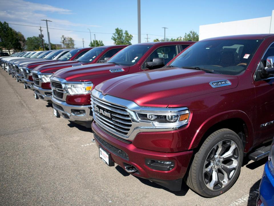 Ram trucks at a car dealership.