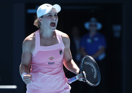 Tennis - Australian Open - Fourth Round - Melbourne Park, Melbourne, Australia, January 20, 2019. Australia's Ashleigh Barty celebrates winning the match against Russia's Maria Sharapova. REUTERS/Lucy Nicholson