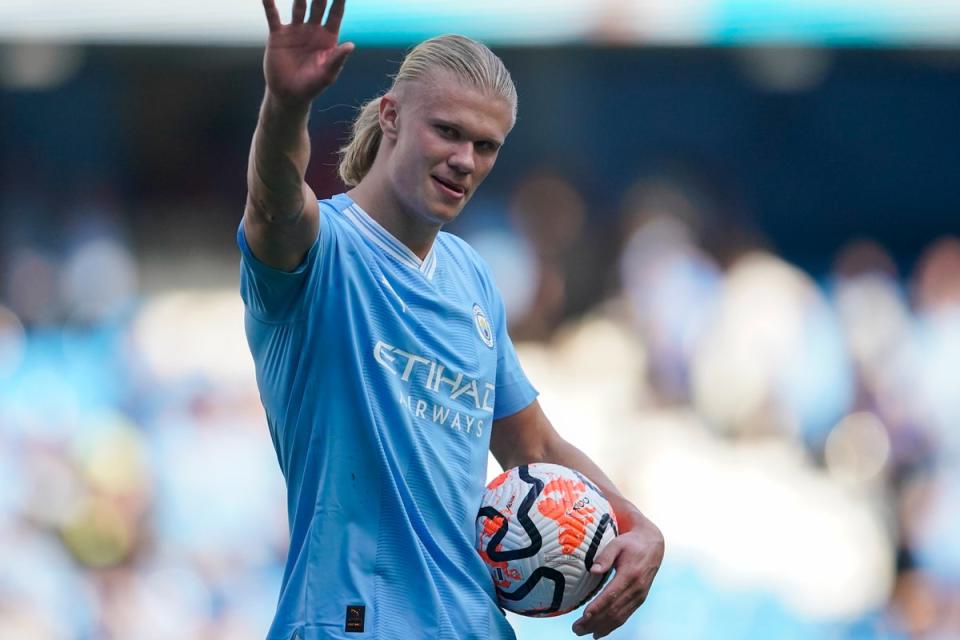 Hat-trick hero: Erling Haaland celebrated his PFA Player of the Year win with a trademark treble for Man City  (AP)