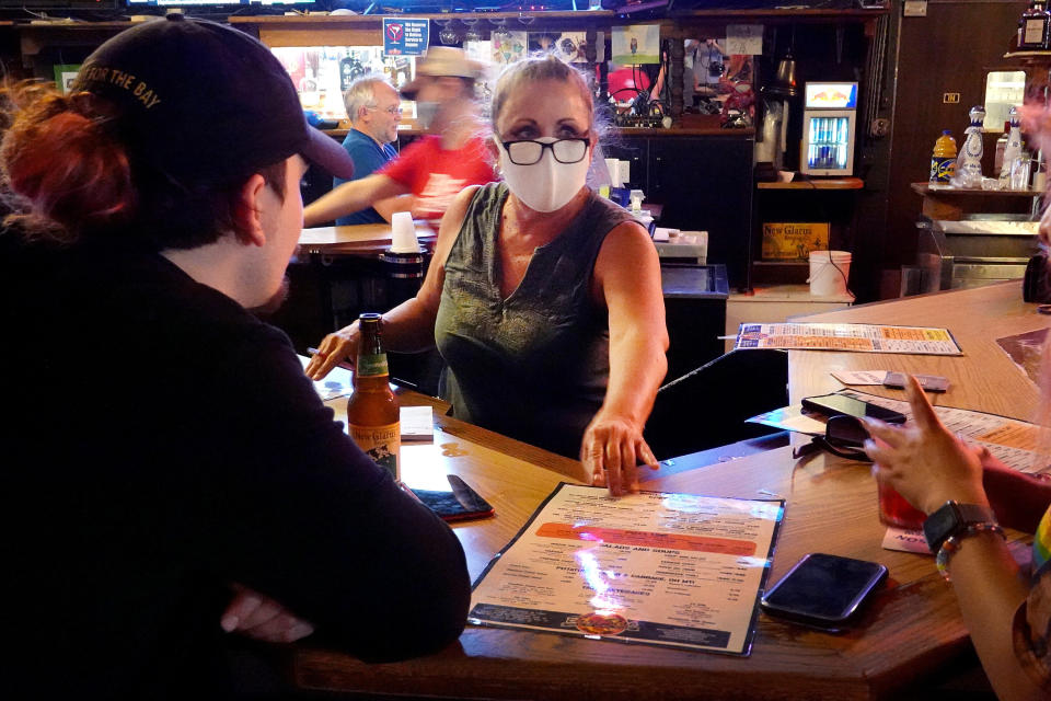 Customers eat and drink at the Brat Stop, a popular bar, restaurant and tourist attraction on May 15, 2020, in Kenosha, Wisconsin. (Photo: Scott Olson via Getty Images)