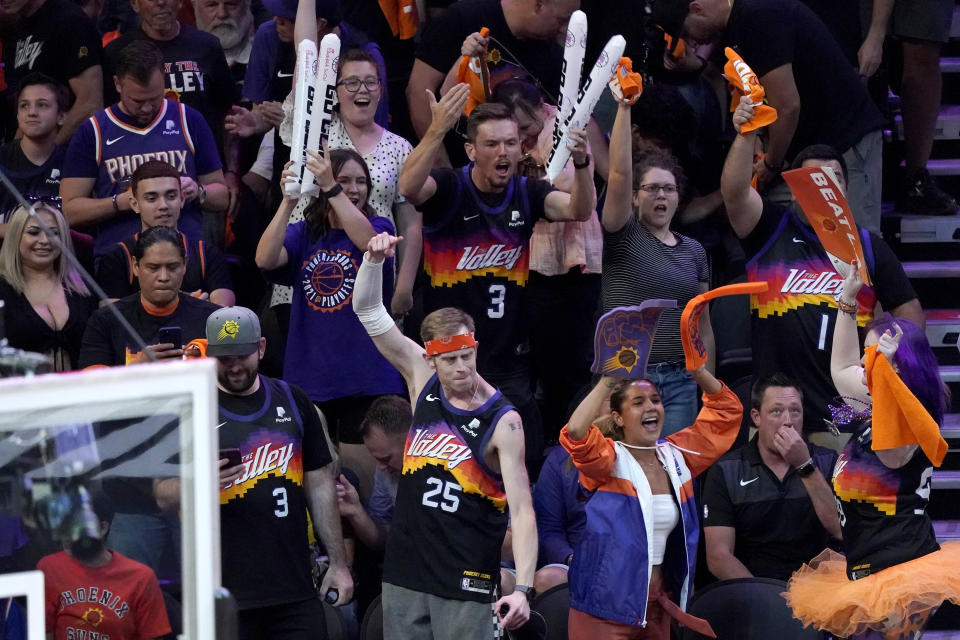 Phoenix Suns cheer prior to game 5 of the NBA basketball Western Conference Finals against the Los Angeles Clippers, Monday, June 28, 2021, in Phoenix. (AP Photo/Matt York)