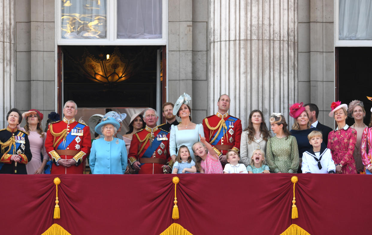 Her Majesty The Queen, Prince Charles, Prince Harry, Meghan Duchess of Sussex, Catherine Duchess of Cambridge, Prince William, Duke of Cambridge, with Princess Charlotte, Prince George, Savanna Phillips and members of the Royal Family on the balcony of Buckingham Palace at Trooping The Colour, London. Photo credit should read: Doug Peters/EMPICS