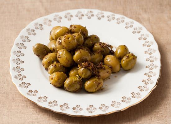 <strong>Get the <a href="http://www.huffingtonpost.com/2011/10/27/cumin--and-lemon-scented-_n_1059494.html">Cumin-and Lemon-Scented Green Olives recipe</a></strong>
