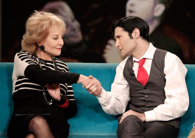 Barbara Walters and Corey Feldman shake hands after an interaction on 
