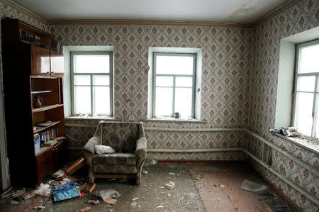 Disused furniture sits in an abandoned apartment inside a nine-storey block of flats in the Oktyabrsky district in Donetsk, Ukraine, November 1, 2017. REUTERS/Alexander Ermochenko